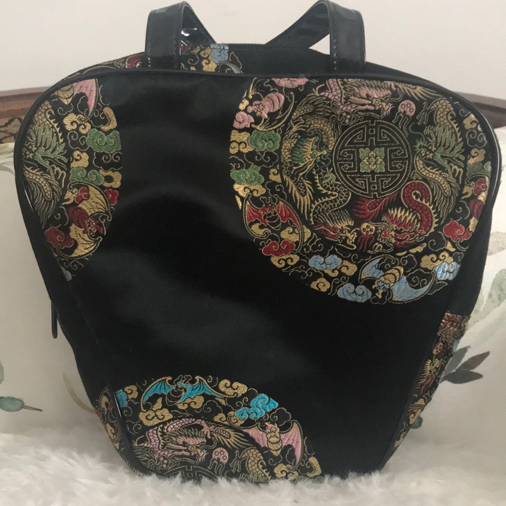 Betsy Johnson small  hand held Embroidered type bag